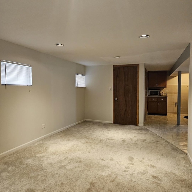 5823 W Addison St, Chicago, IL 60634 - basement featuring light colored carpet, plenty of natural light, and recessed lighting