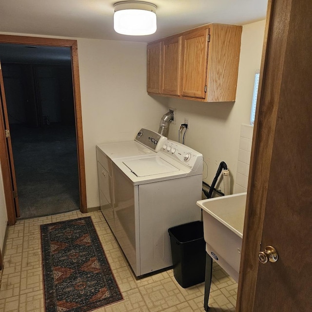 5823 W Addison St, Chicago, IL 60634 - laundry room with washer and dryer and cabinet space