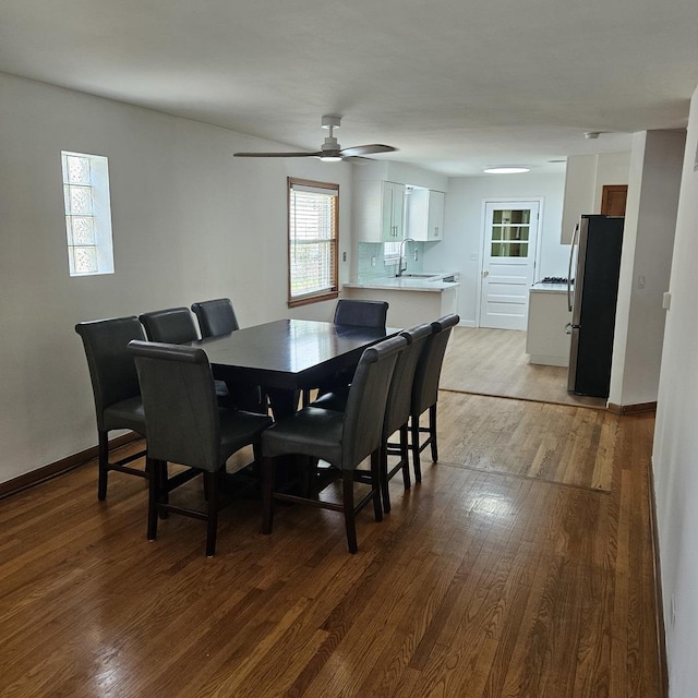 5823 W Addison St, Chicago, IL 60634 - dining area with light wood-style flooring and ceiling fan