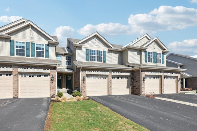 1917 Turtle Creek Ct, Aurora, IL 60503 - multi unit property with driveway, an attached garage, and brick siding