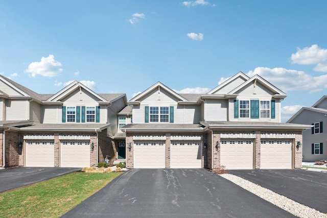 1917 Turtle Creek Ct, Aurora, IL 60503 - view of property featuring driveway, brick siding, and an attached garage