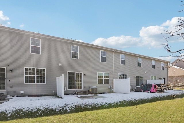1917 Turtle Creek Ct, Aurora, IL 60503 - snow covered back of property featuring a lawn