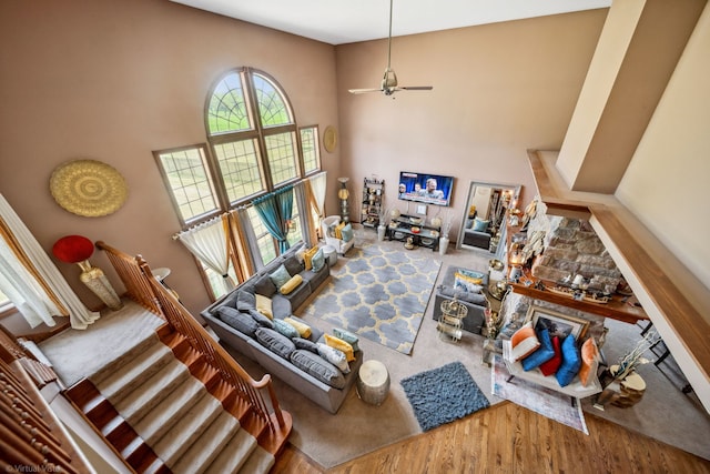 26200 W Chatham Dr, Plainfield, IL 60585 - living area featuring a towering ceiling, wood finished floors, and ceiling fan