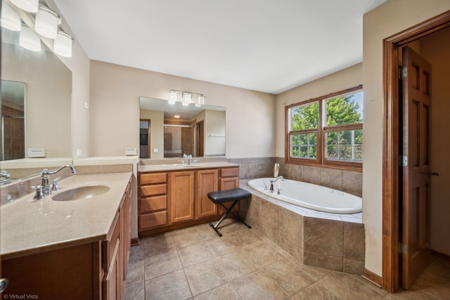 26200 W Chatham Dr, Plainfield, IL 60585 - bathroom featuring two vanities, a shower stall, a garden tub, and tile patterned flooring