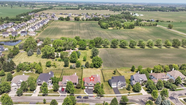 26200 W Chatham Dr, Plainfield, IL 60585 - aerial view of sparsely populated area with nearby suburban area and a large body of water