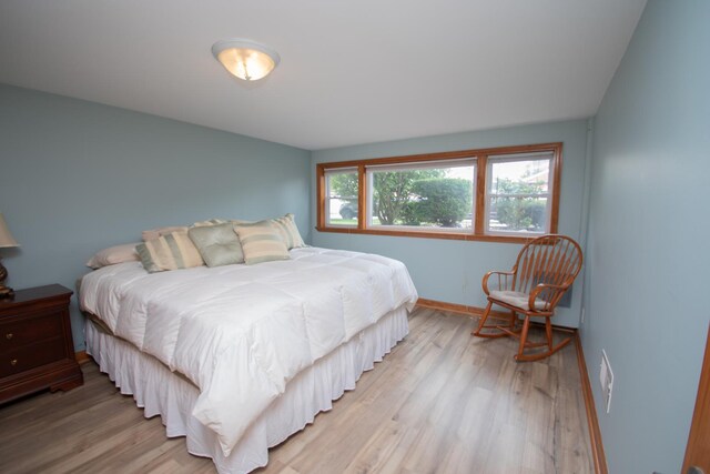 5518 S Melvina Ave, Chicago, IL 60638 - bedroom featuring light wood-type flooring