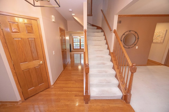 14803 S Hawthorn Cir, Plainfield, IL 60544 - staircase with wood finished floors and baseboards
