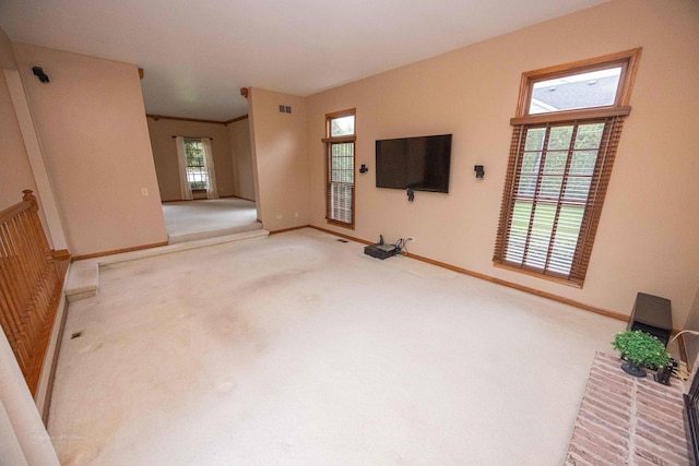 14803 S Hawthorn Cir, Plainfield, IL 60544 - unfurnished living room featuring carpet and baseboards