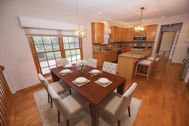 14803 S Hawthorn Cir, Plainfield, IL 60544 - dining room with a chandelier, light wood-style flooring, and recessed lighting