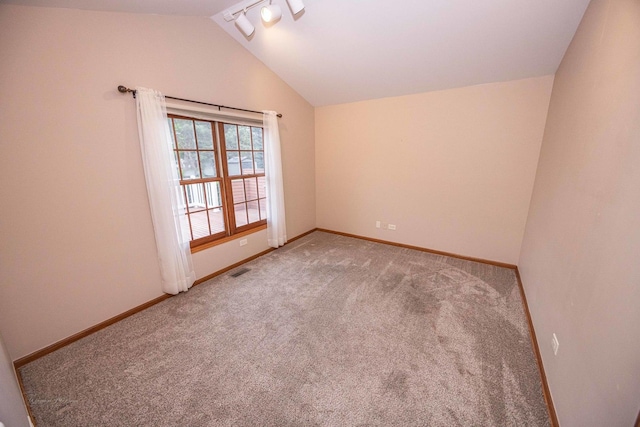 14803 S Hawthorn Cir, Plainfield, IL 60544 - carpeted spare room with vaulted ceiling and track lighting