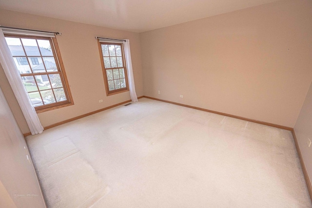 14803 S Hawthorn Cir, Plainfield, IL 60544 - spare room with plenty of natural light and light colored carpet