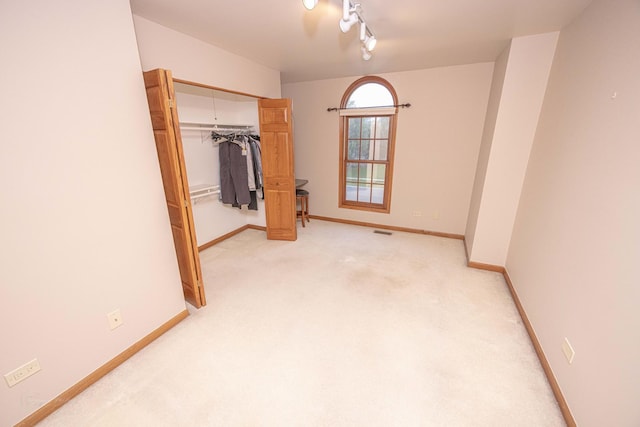 14803 S Hawthorn Cir, Plainfield, IL 60544 - unfurnished bedroom featuring light colored carpet and a closet