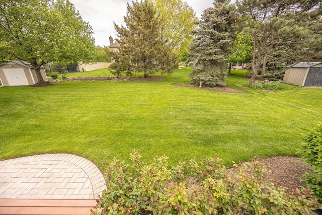 14803 S Hawthorn Cir, Plainfield, IL 60544 - view of green lawn featuring a storage unit