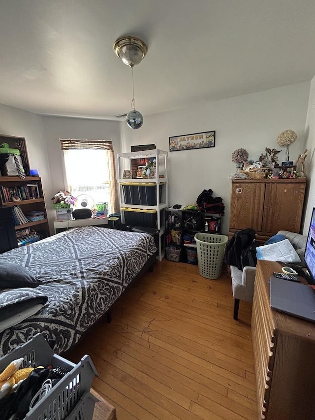 3247 W Berteau Ave, Chicago, IL 60618 - bedroom with hardwood / wood-style flooring