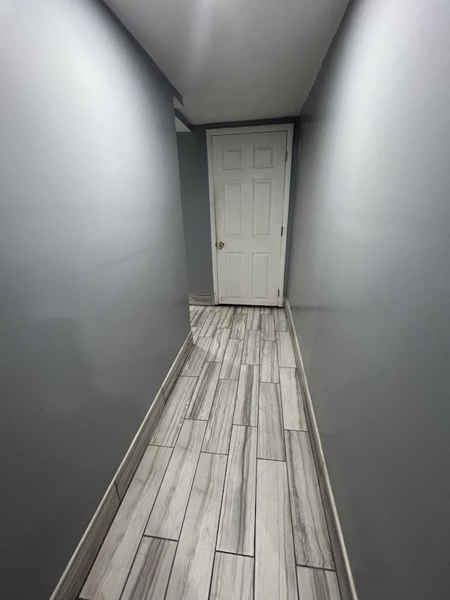3247 W Berteau Ave, Chicago, IL 60618 - hallway with wood tiled floors and baseboards