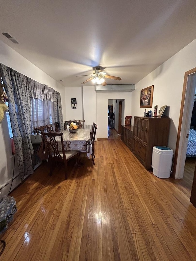 3247 W Berteau Ave, Chicago, IL 60618 - dining room with wood finished floors and a ceiling fan