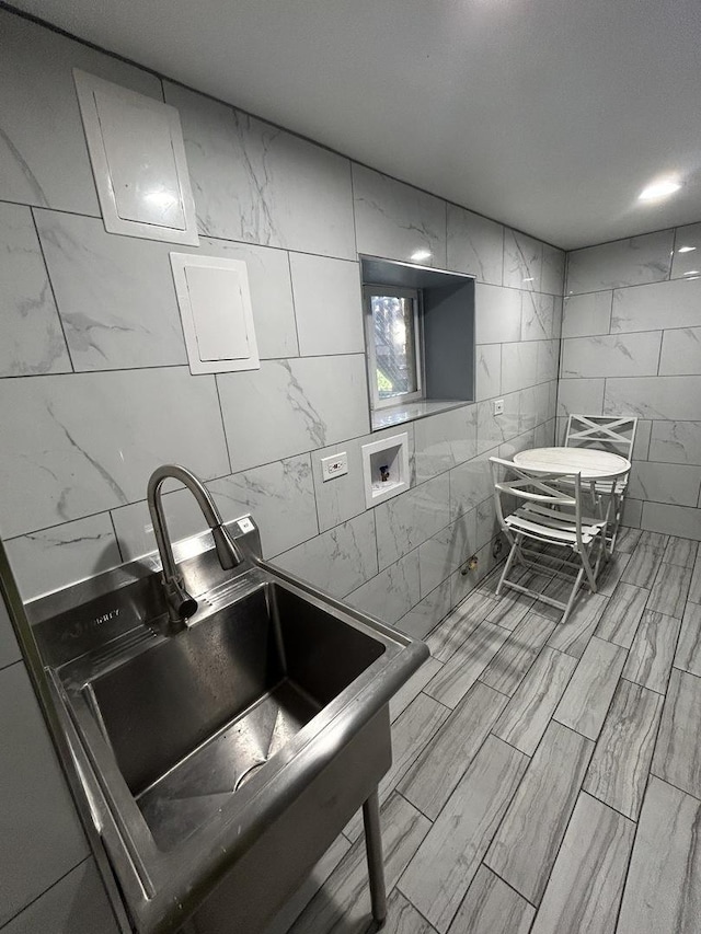 3247 W Berteau Ave, Chicago, IL 60618 - kitchen featuring a sink and tile walls