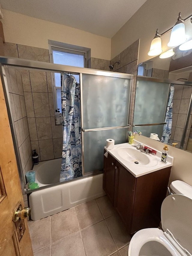3247 W Berteau Ave, Chicago, IL 60618 - bathroom featuring combined bath / shower with glass door, vanity, and tile patterned floors