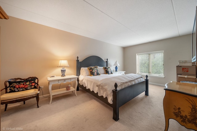 865 E 22nd St Unit 214, Lombard, IL 60148 - bedroom with light carpet and baseboards