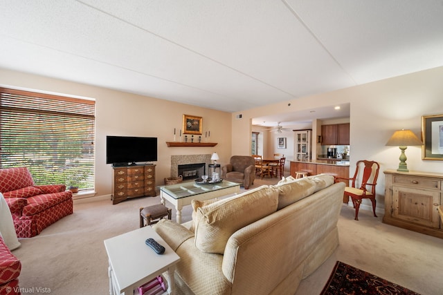 865 E 22nd St Unit 214, Lombard, IL 60148 - living room featuring light carpet and a tiled fireplace
