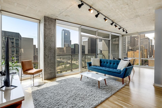 611 S Wells St Unit 1304, Chicago, IL 60607 - sunroom / solarium with rail lighting and a view of city