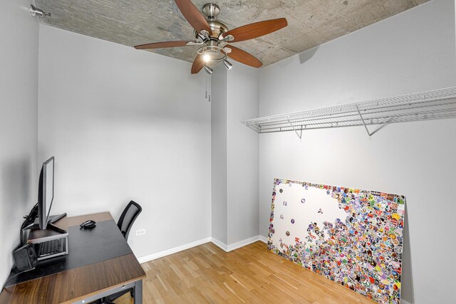 611 S Wells St Unit 1304, Chicago, IL 60607 - home office featuring ceiling fan and wood finished floors