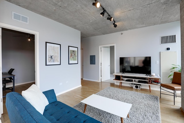 611 S Wells St Unit 1304, Chicago, IL 60607 - living area with electric panel, light wood finished floors, and track lighting