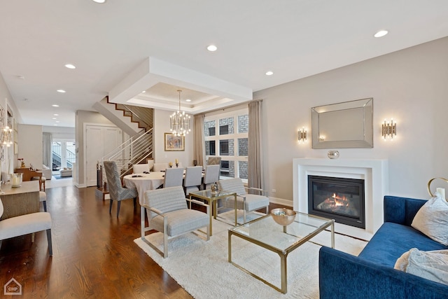1807 W Ohio St, Chicago, IL 60622 - living area featuring stairway, wood finished floors, a glass covered fireplace, recessed lighting, and a raised ceiling
