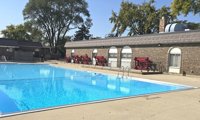 10 Cour Masson Unit 10, Palos Hills, IL 60465 - community pool featuring a patio area
