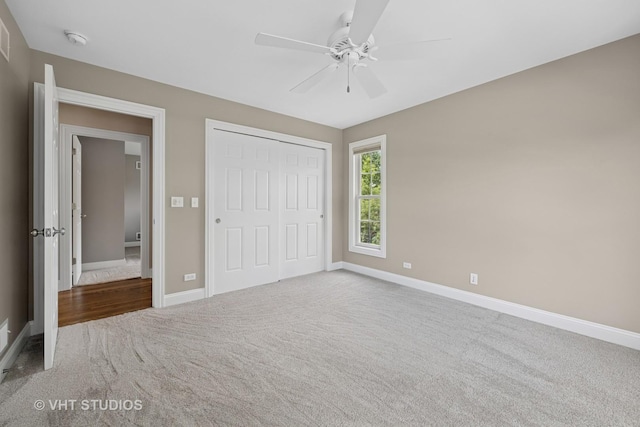 605 Red Cypress Dr, Cary, IL 60013 - unfurnished bedroom featuring carpet floors, a closet, and a ceiling fan