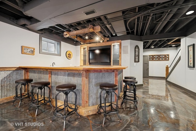 605 Red Cypress Dr, Cary, IL 60013 - indoor wet bar featuring baseboards