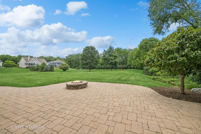 605 Red Cypress Dr, Cary, IL 60013 - view of patio with a fire pit