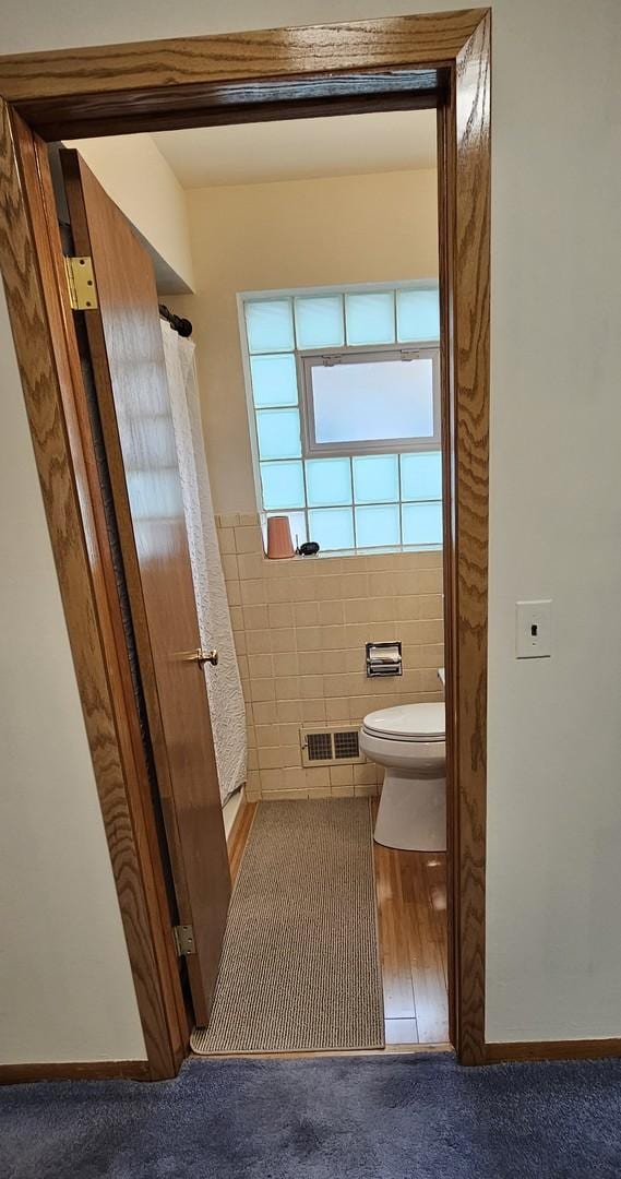 5705 N Oketo Ave, Chicago, IL 60631 - bathroom with toilet and tile walls
