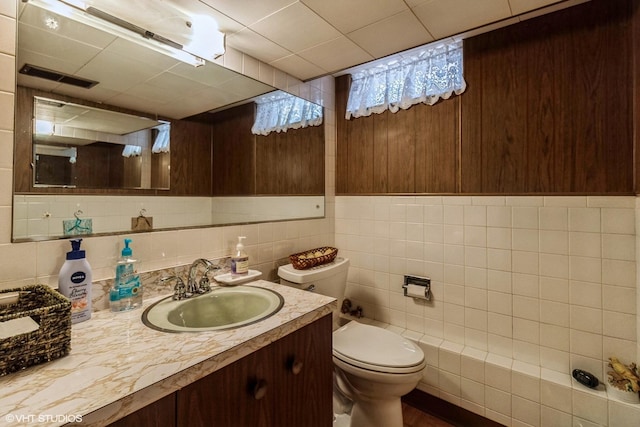 5705 N Oketo Ave, Chicago, IL 60631 - half bath featuring vanity and tile walls