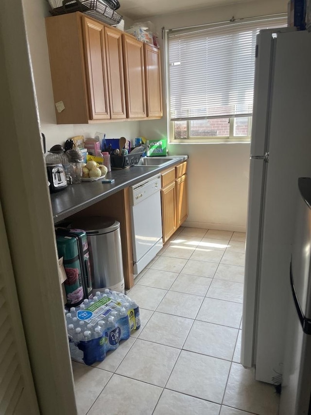 6827 N Oakley Ave Unit 3C, Chicago, IL 60645 - kitchen with white appliances and light tile patterned flooring