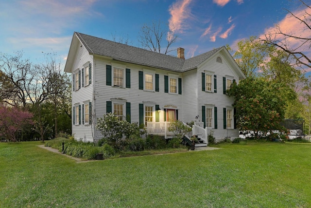 29460 Roberts Rd, Mchenry, IL 60051 - colonial house with a chimney, a front lawn, and roof with shingles
