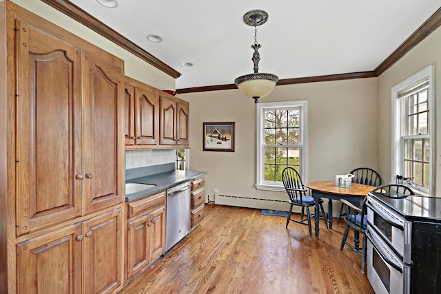 29460 Roberts Rd, Mchenry, IL 60051 - kitchen featuring appliances with stainless steel finishes, crown molding, light wood-style floors, brown cabinets, and decorative light fixtures