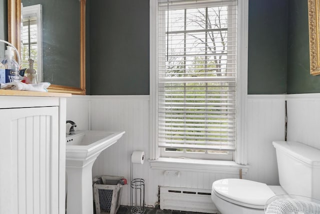 29460 Roberts Rd, Mchenry, IL 60051 - bathroom with baseboard heating, a wainscoted wall, and radiator