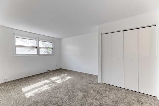 3317 Birchwood Dr, Hazel Crest, IL 60429 - unfurnished bedroom with carpet flooring and a closet