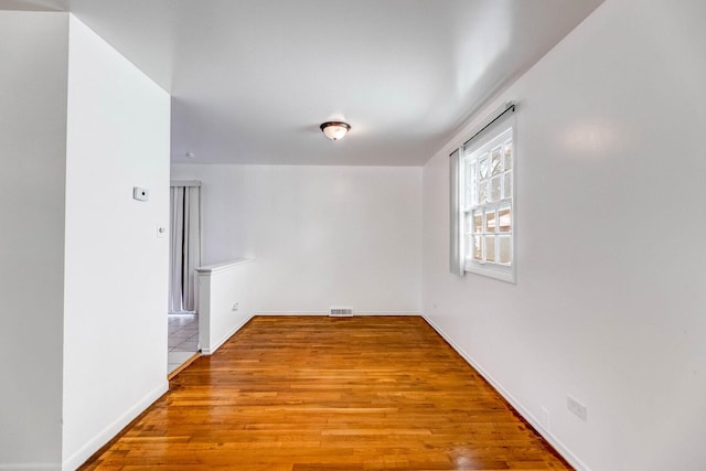 3317 Birchwood Dr, Hazel Crest, IL 60429 - spare room with wood finished floors