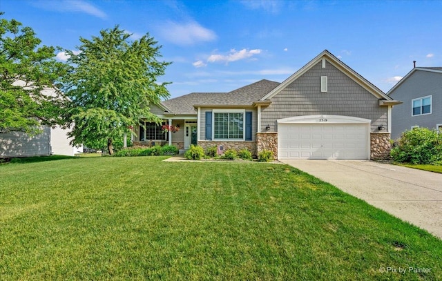 2519 Imgrund Rd, North Aurora, IL 60542 - view of front of property with a garage, stone siding, driveway, and a front yard