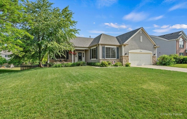 2519 Imgrund Rd, North Aurora, IL 60542 - view of front facade with stone siding, concrete driveway, and a garage