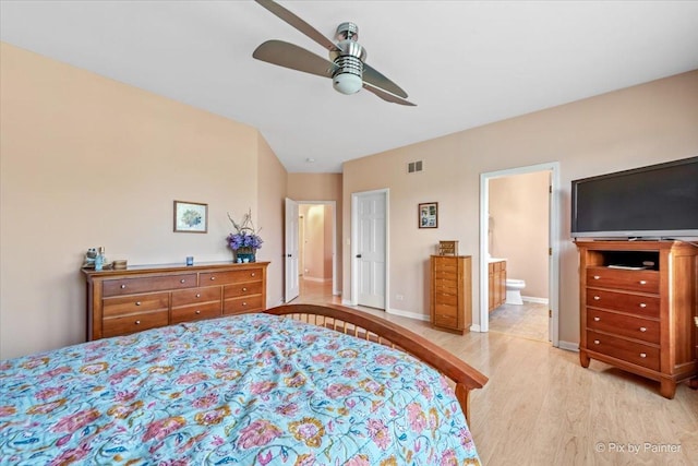 2519 Imgrund Rd, North Aurora, IL 60542 - bedroom with light wood-style flooring, lofted ceiling, ensuite bath, and a ceiling fan