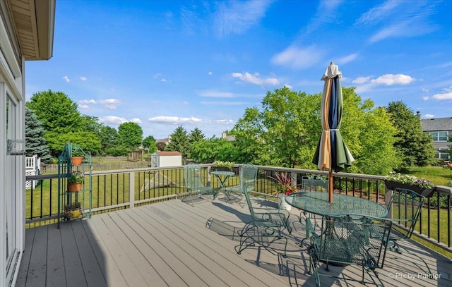 2519 Imgrund Rd, North Aurora, IL 60542 - wooden terrace featuring outdoor dining area and a lawn