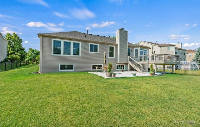 2519 Imgrund Rd, North Aurora, IL 60542 - rear view of property with a patio, a chimney, a wooden deck, and stairs