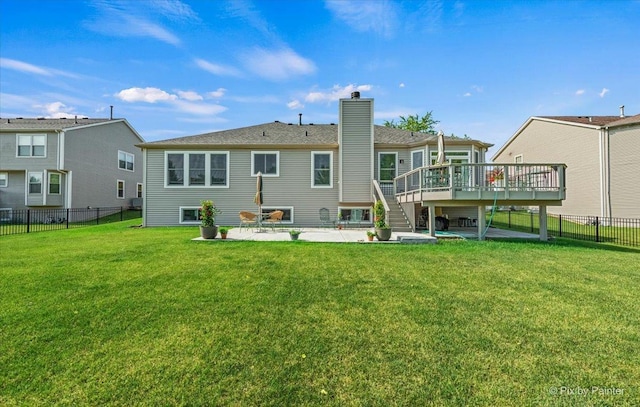2519 Imgrund Rd, North Aurora, IL 60542 - back of house with a wooden deck, a chimney, a fenced backyard, a patio area, and stairs