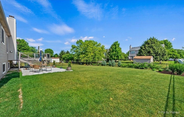 2519 Imgrund Rd, North Aurora, IL 60542 - fenced backyard featuring a patio area and a storage shed