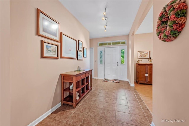 2519 Imgrund Rd, North Aurora, IL 60542 - entrance foyer with track lighting and light tile patterned floors