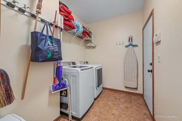 2519 Imgrund Rd, North Aurora, IL 60542 - laundry room featuring separate washer and dryer and baseboards