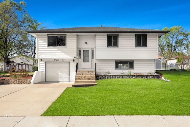 728 Boxwood Dr, Schaumburg, IL 60193 - bi-level home with an attached garage, entry steps, concrete driveway, and roof with shingles